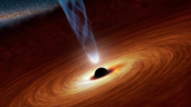 أضخم ثقب أسود بالكون يلتهم 