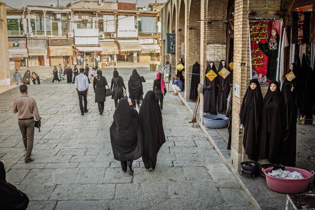 Isfahan,,Iran,-,August,20,,2016:,Women,Wearing,Black,Chador
Shutterstouck