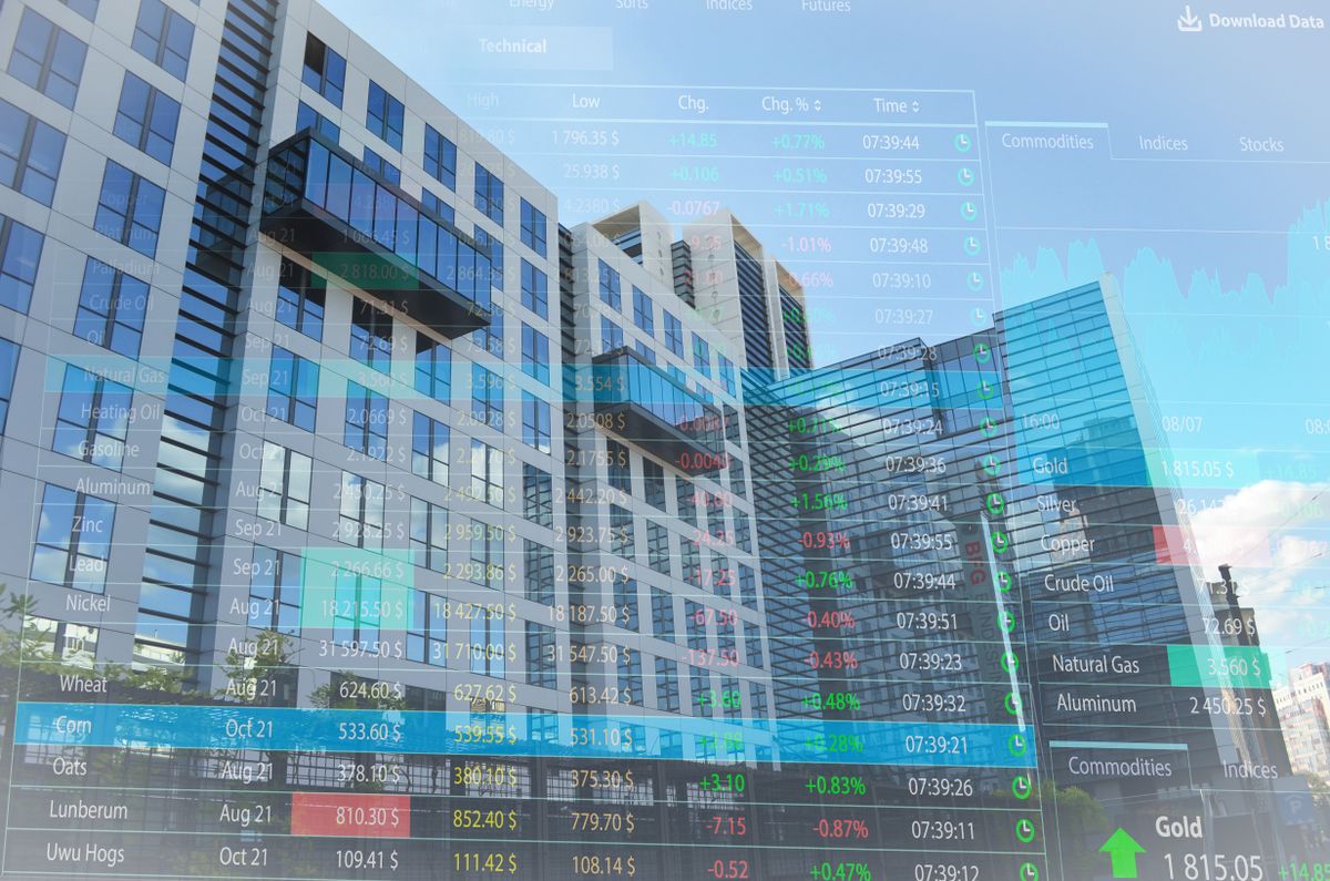 Double,Exposure,Of,Online,Trading,Platform,And,Buildings,In,City | Shutterstock