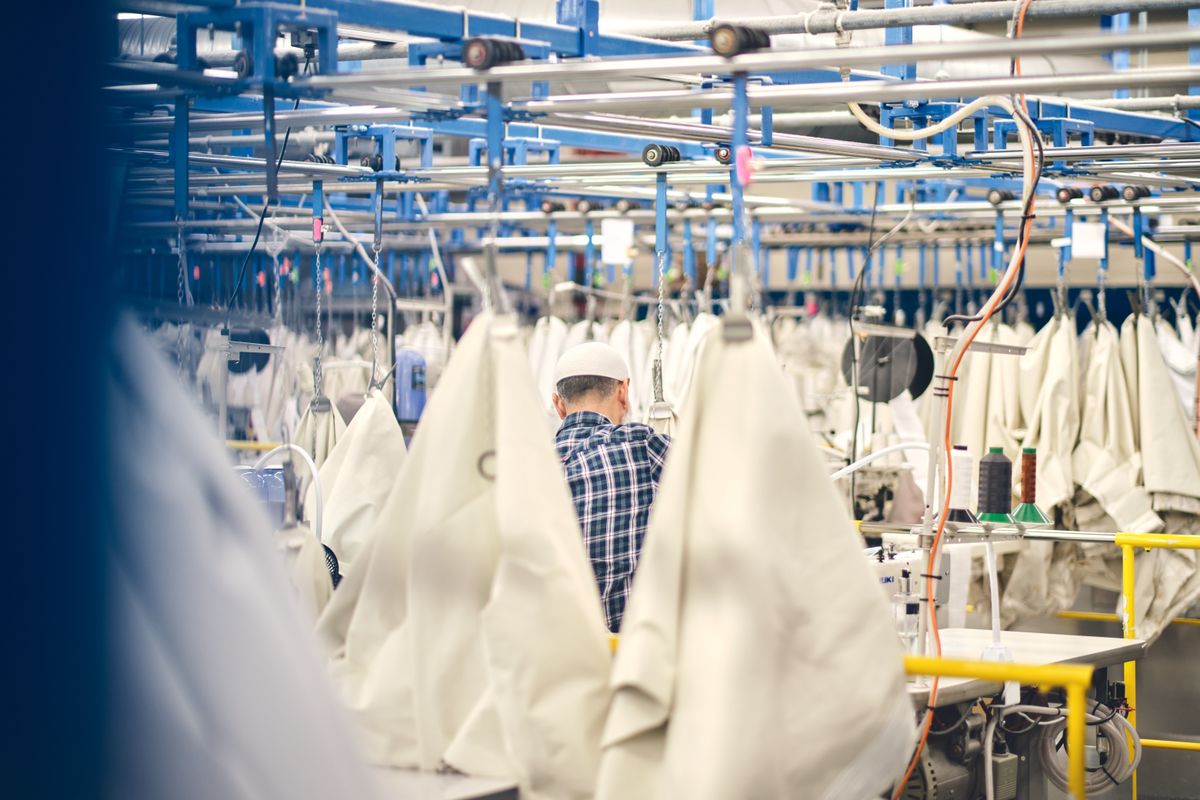 Kent,,Uk,,01.01.2024,Sewing,Machine,Workers,Sewing,In,A,Textile | Shutterstock