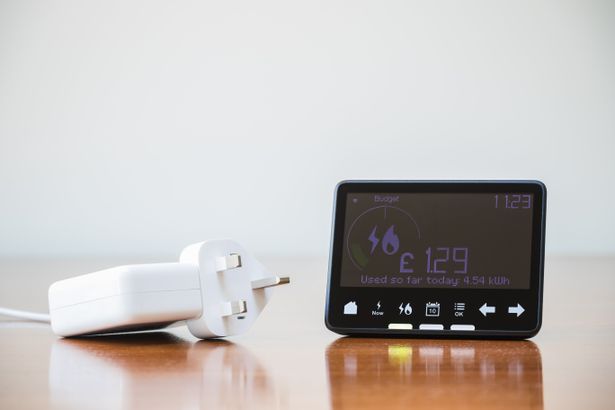 Smart,Meter,Placed,Next,To,An,Electric,Plug | Shutterstock