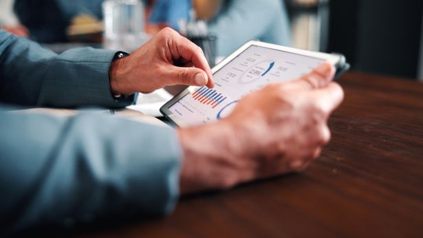 Data,Analysis,,Online,And,Hands,With,Tablet,Screen,In,Office, | Shutterstock
