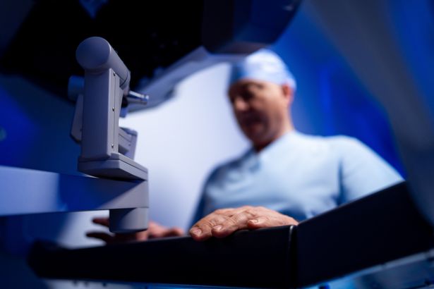 Close,Up,Of,Surgeon,Hands,On,Robotic,Console,Controls.,Detailed | Shutterstock