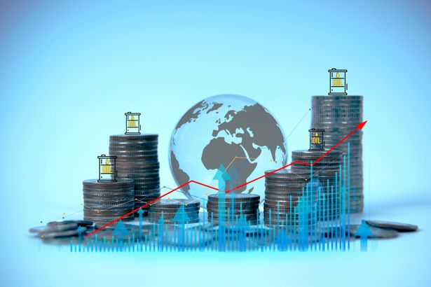 Oil,Price,Growth,Concept,With,Stacked,Coins,And,Global,Graph | Shutterstock