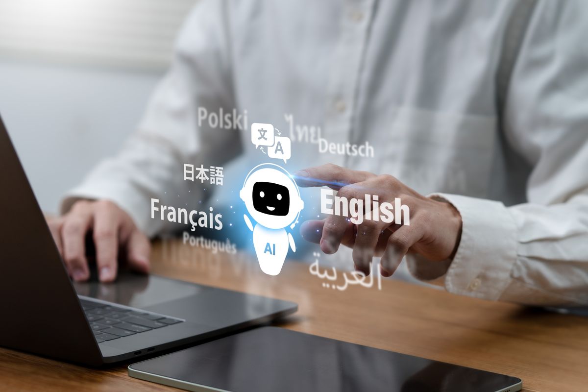 Ai,Translate,Language,Concept.businessman,Using,Ai,Translator,With,Blue,Background, | Shutterstock